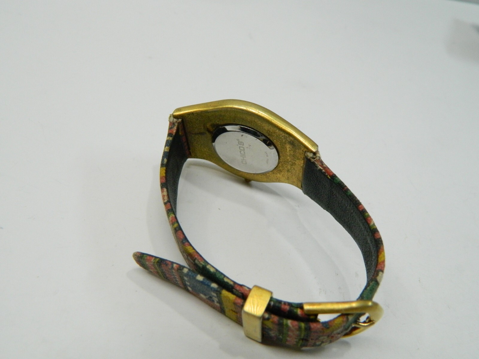 CHICO’S FUNKY Psychedelic brushed gold tone lady’s watch/wristwatch