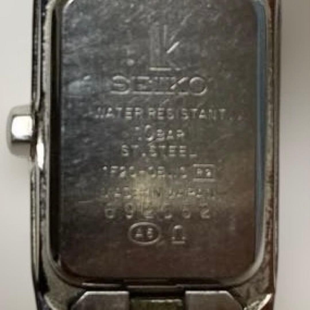 Silver stainless steel rectangular wristwatch