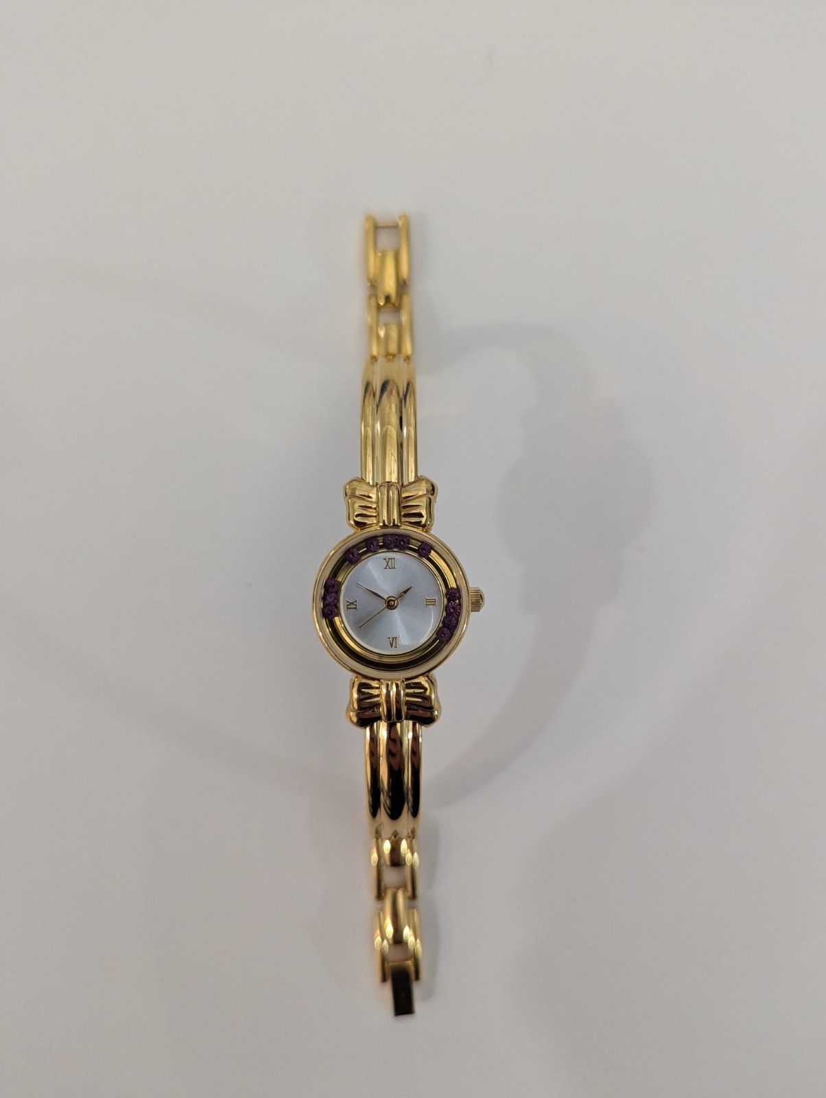 Vintage Gold-Tone Ladies Watch Purple Stone Accents Mother of Pearl Dial