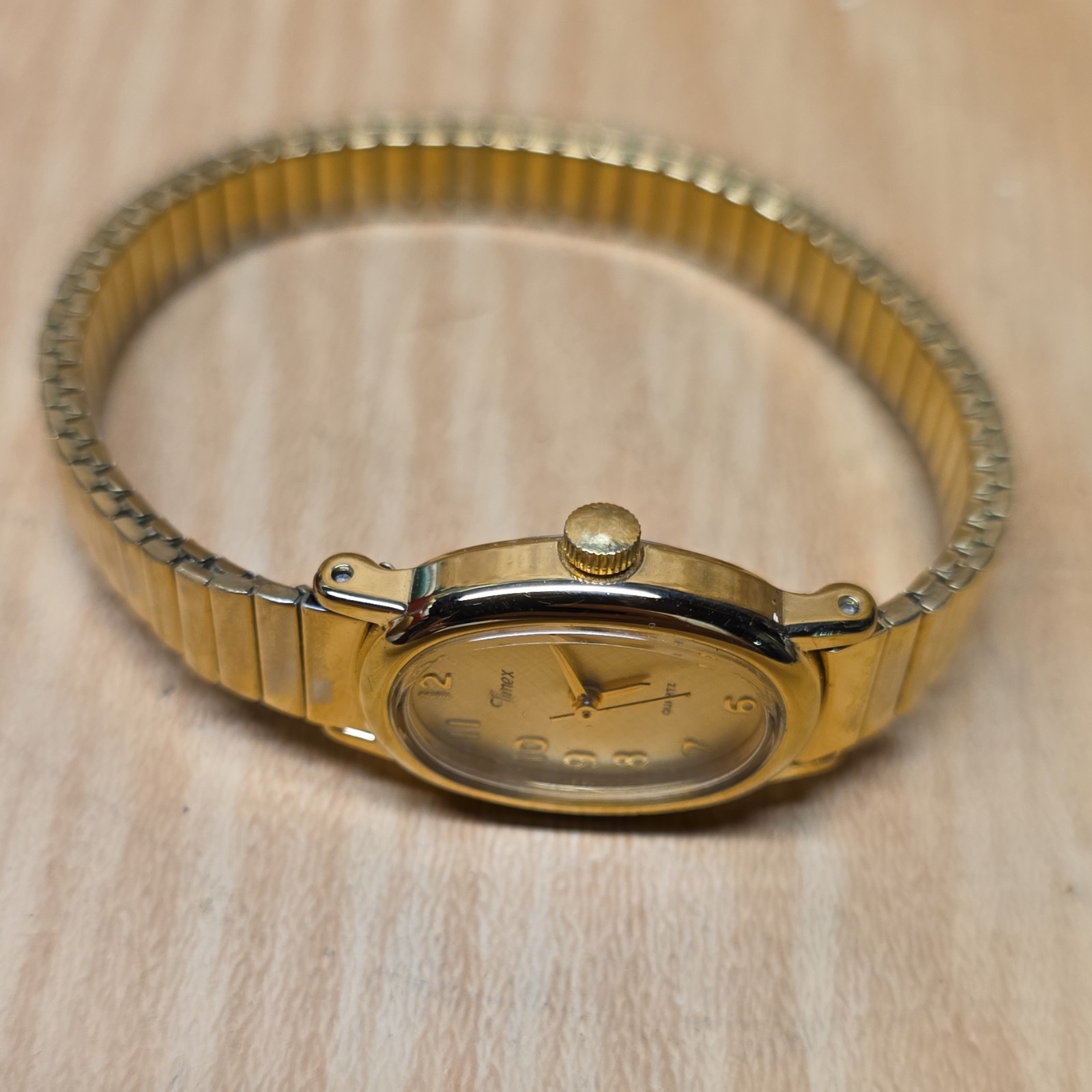 Timex Women Quartz Oval Analog Bracelet Watch Gold Tone Silver Arabic Dial