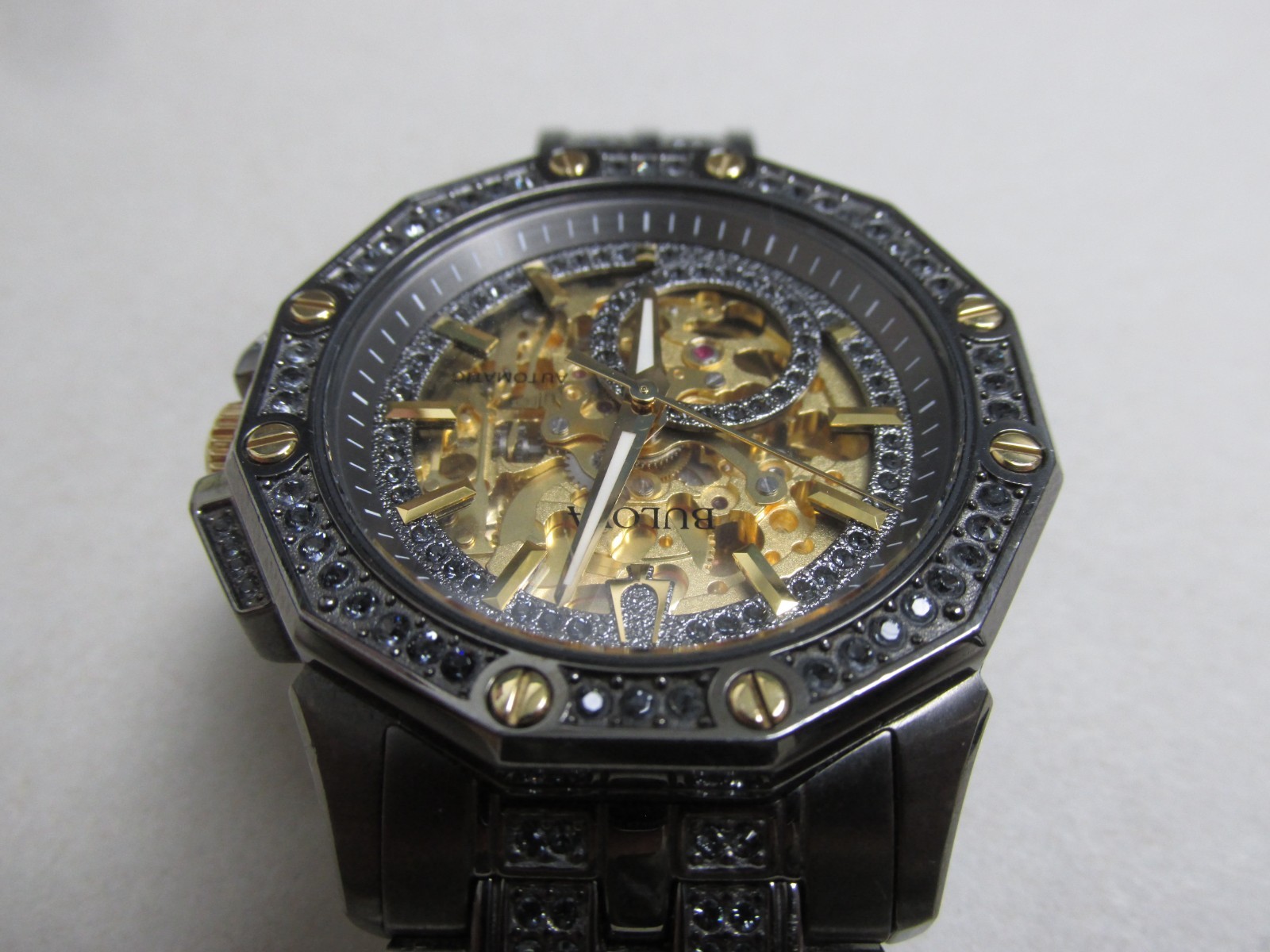 Bulova 98A293 Octava Automatic Gunmetal/Gold Skeleton Dial Men’s SS Watch