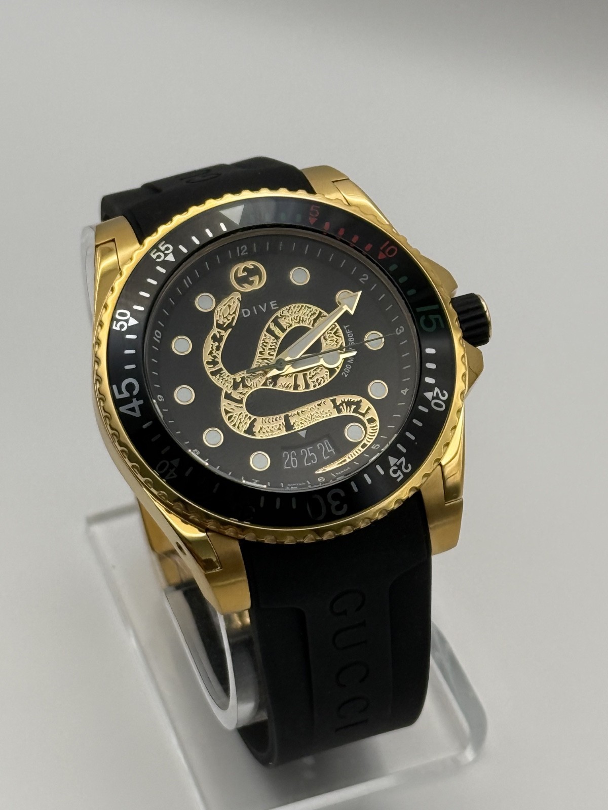 Gucci Dive Black Dial Gold-Tone Rubber Strap 45mm. Men’s Watch YA136219