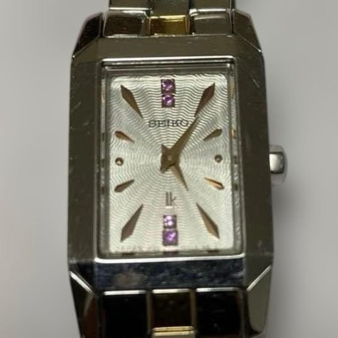 Silver stainless steel rectangular wristwatch