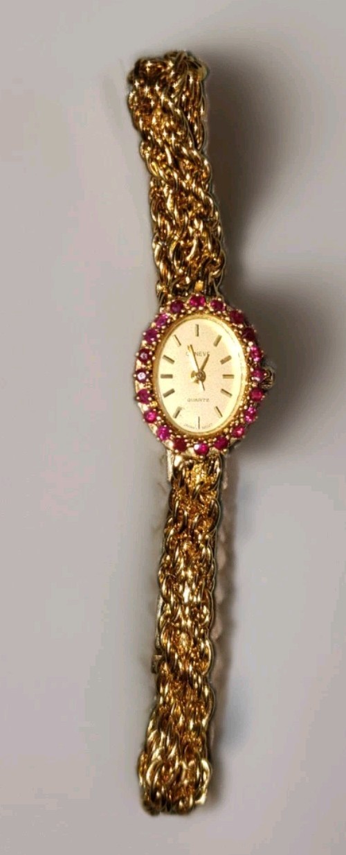 Geneve CL278 Women’s Quartz Gold Oval Wristwatch with Ruby Gem Bezel