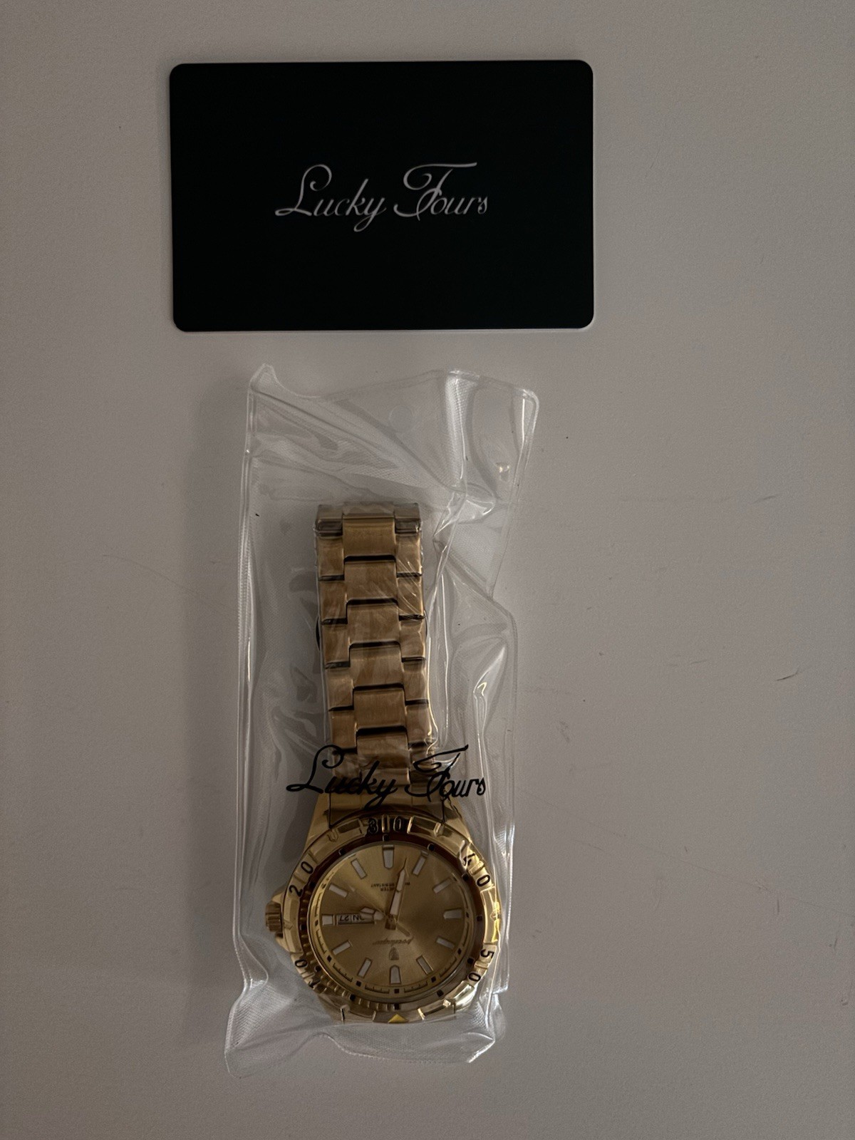 Lucky Fours Men’s Gold Analog Wristwatch Day Date Baton Indexes with Box