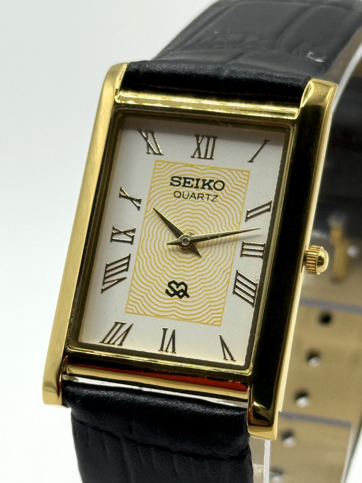Vintage Refurbished Seiko Rectangular White Dial Black Faux Leather Strap