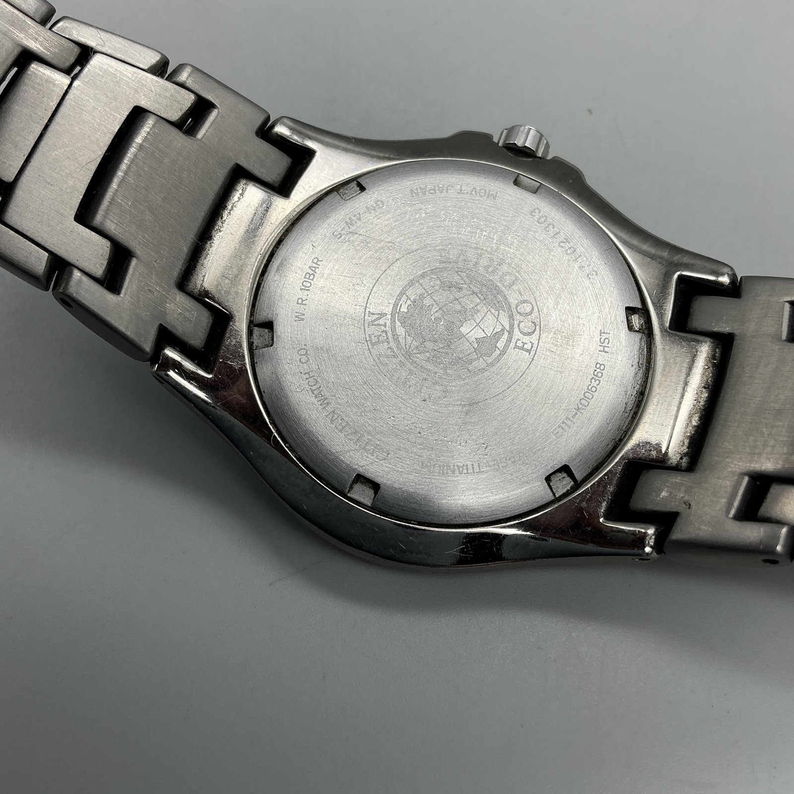 Citizen Eco-Drive Titanium Mens Watch 40mm Black Dial WR 100 E111-K006368 7.25″