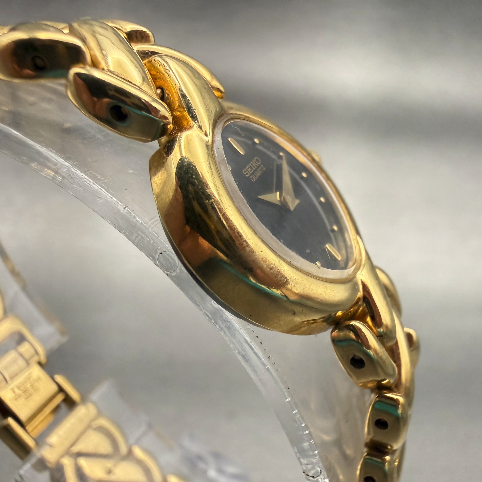 Seiko Watch Women 16mm Black Dial Gold Tone Oval 1F20-5B50 New Battery Vintage