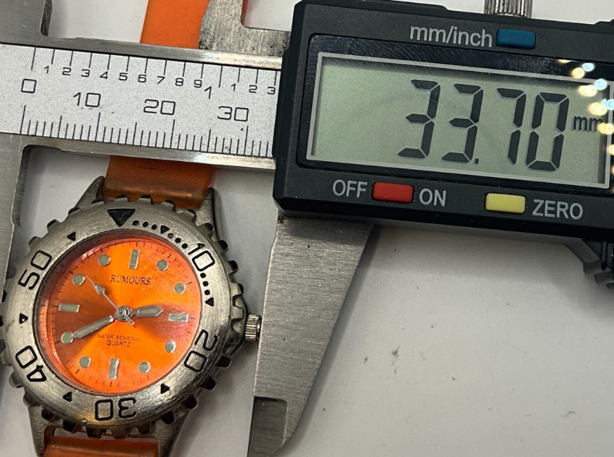 Rarely worn if ever, Rumours womens dive style watch, bold model, new battery