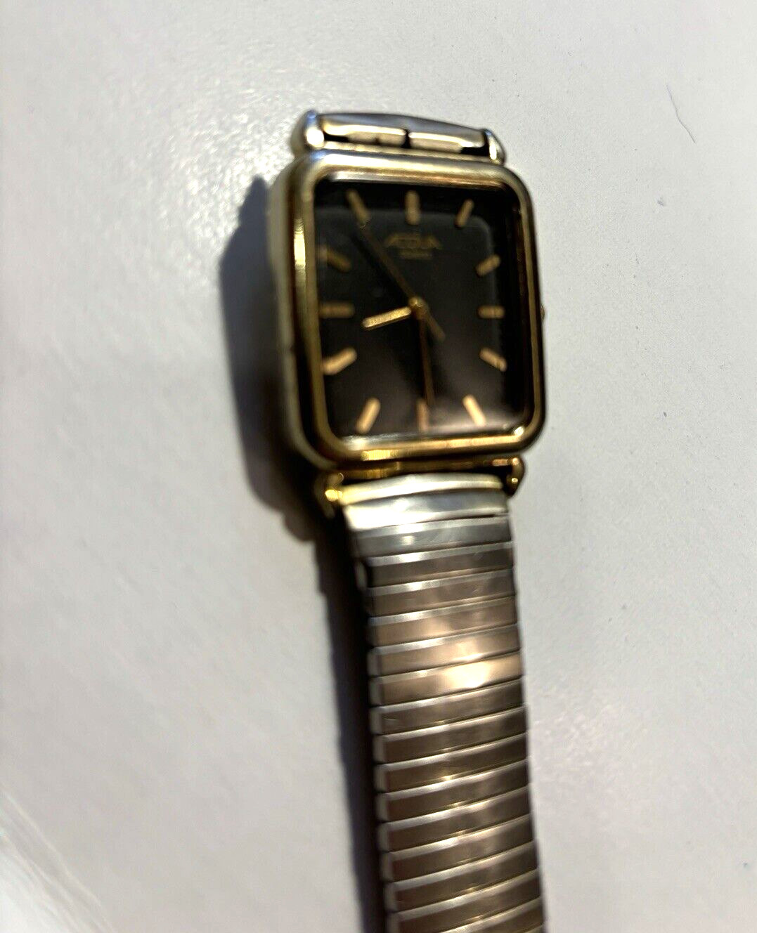 Acqua watch men’s dress formal black gold tone bracelet runs fine – needs band