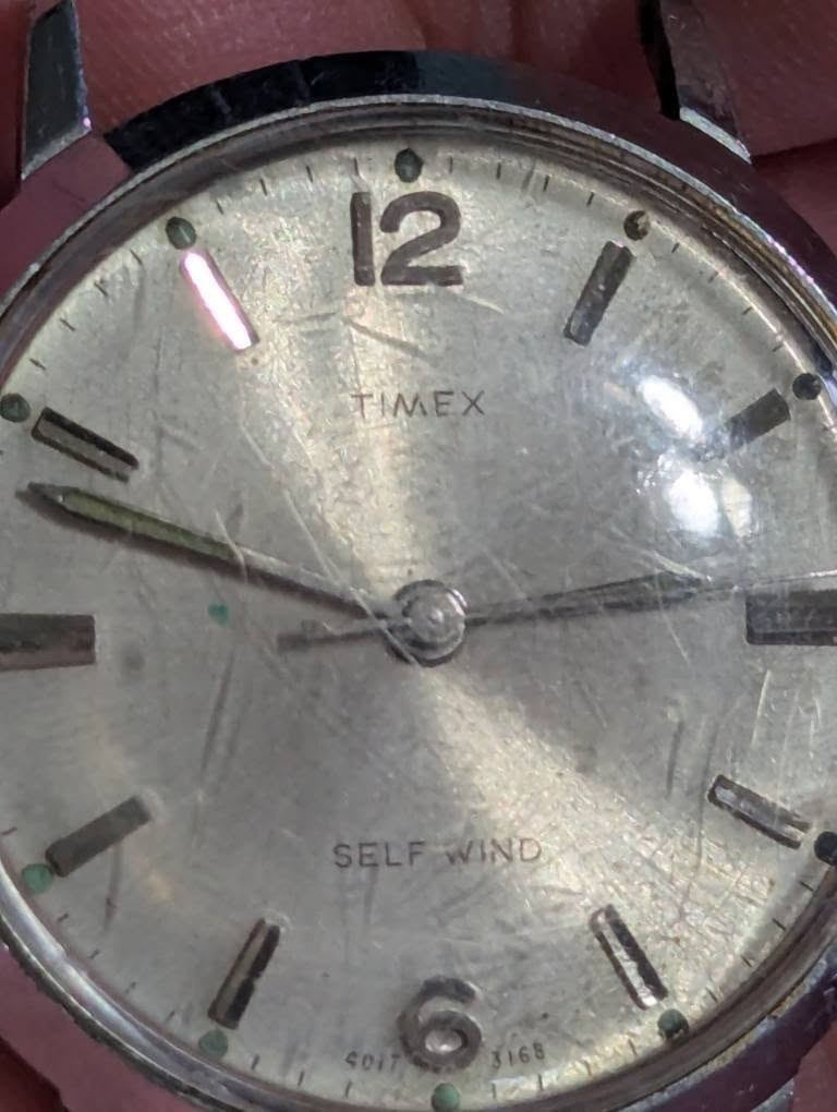 Lot of 4 watches no bands not tested for parts or repair