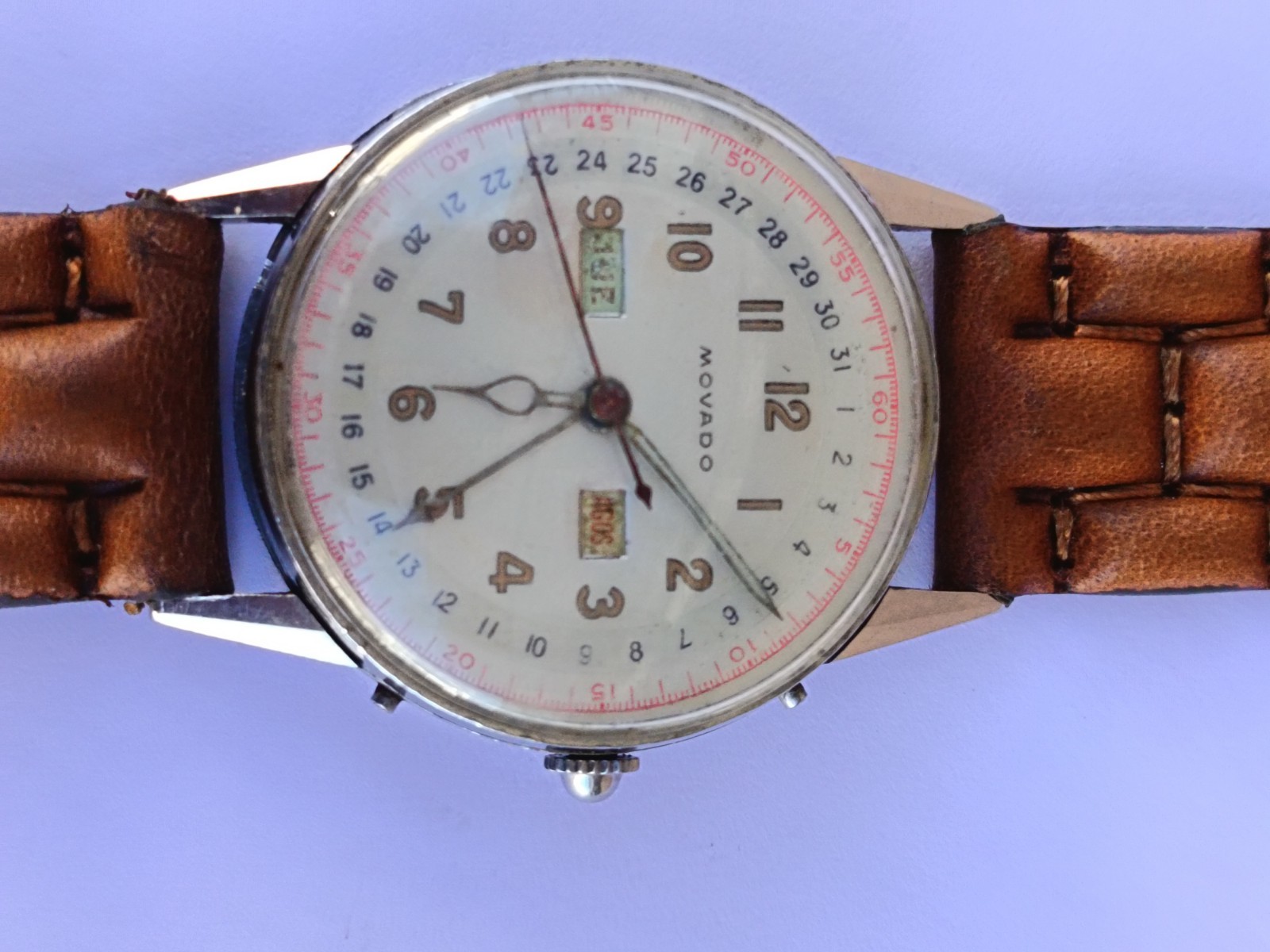 VINTAGE MOVADO TRIPLE DATE. MANUAL WIND. MULTICOLOUR DIAL. RUNNING