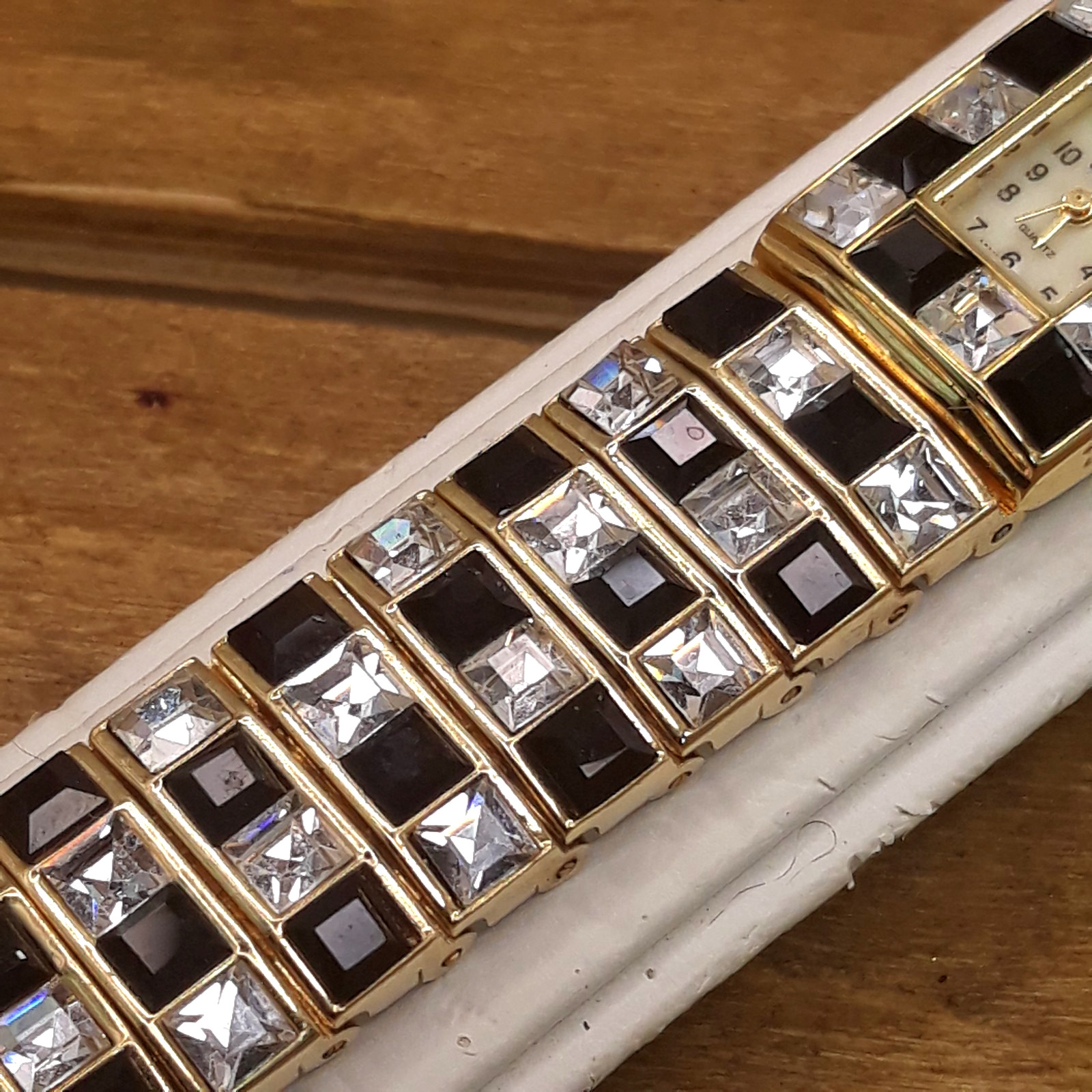 Ladies Geneva Icy Black & Clear Rhinestone Gold Tone Bracelet Watch 7″ (working)