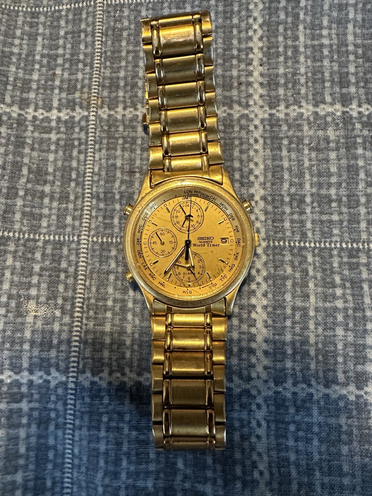 Seiko Quartz World Timer World Time Alarm Date Gold Tone Analog Bracelet