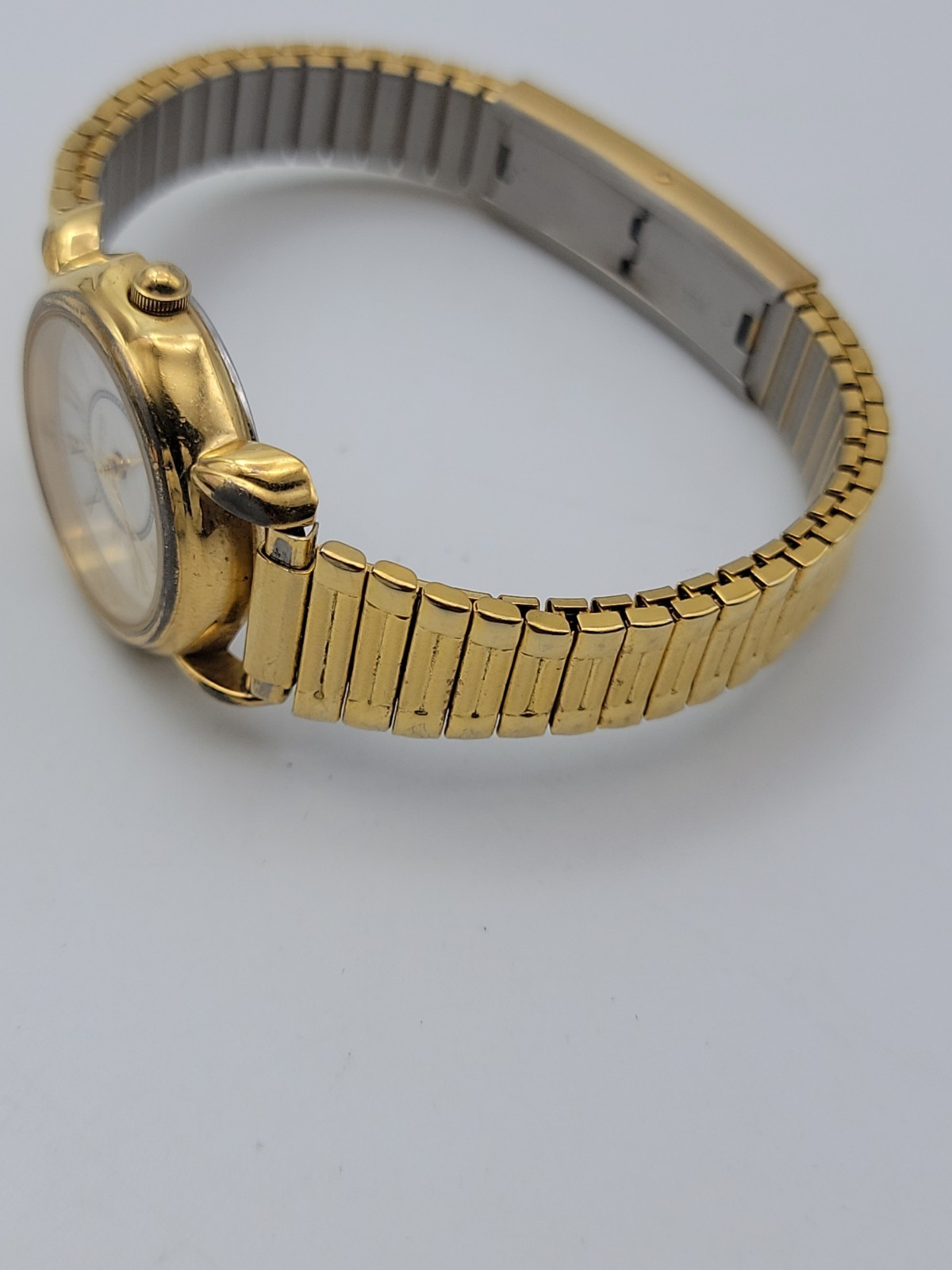 Vtg Guess Women Watch 25mm Gold Tone Stretch Band 6.25″-8.5″, Runs