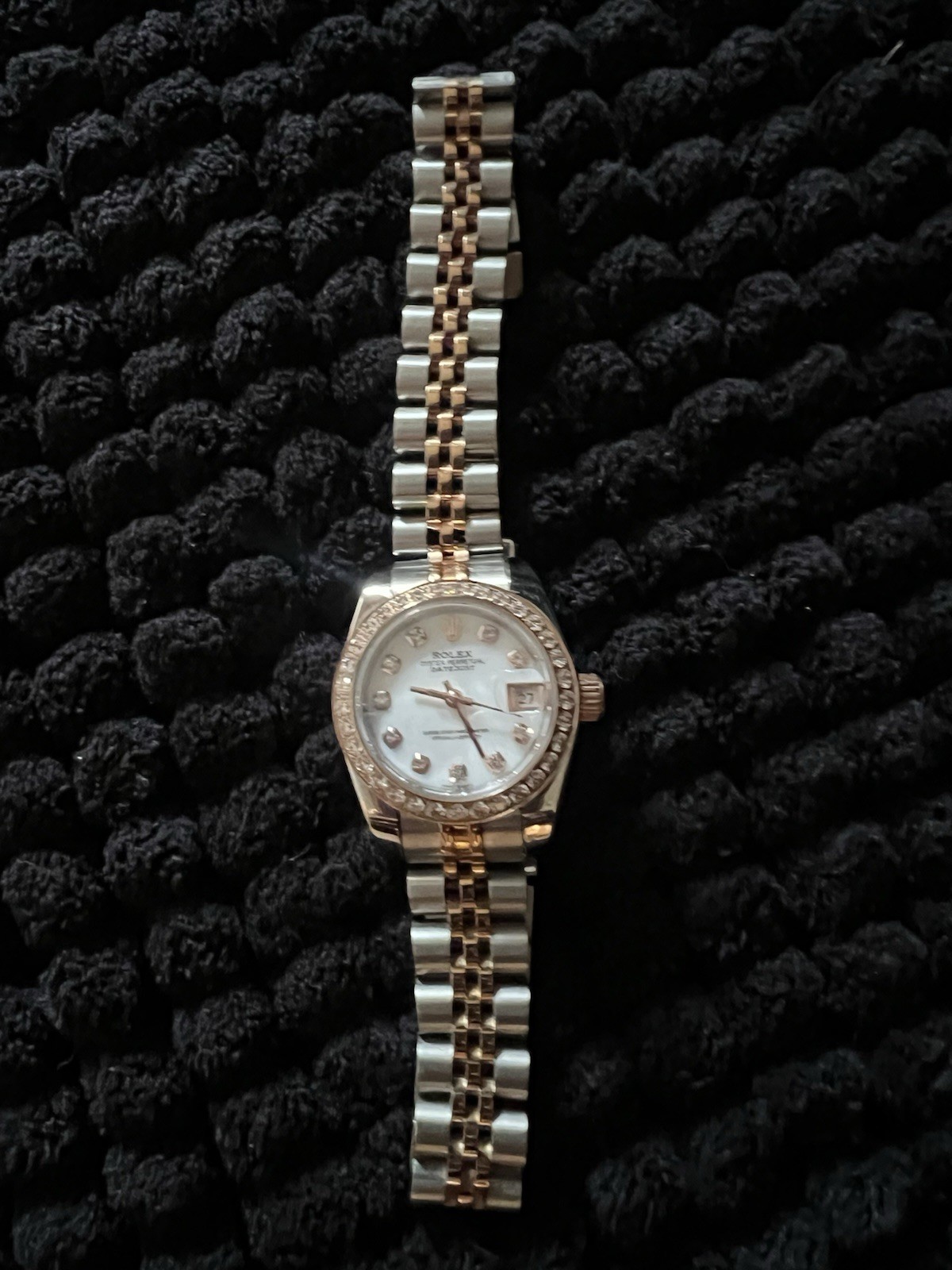 This watch is a 28 mm Rolex Lady-Datejust, model 279381RBR with diamonds