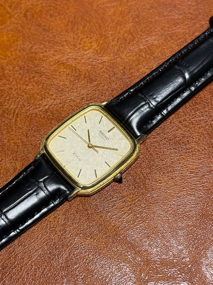 SEIKO Dolce 9521-5220 Quartz Mens Watch Gold Rectangular 1984 New Battery Japan