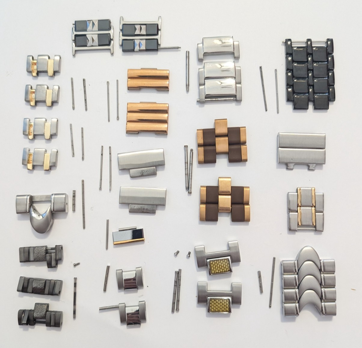 Assorted luxury watch links – brands unknown