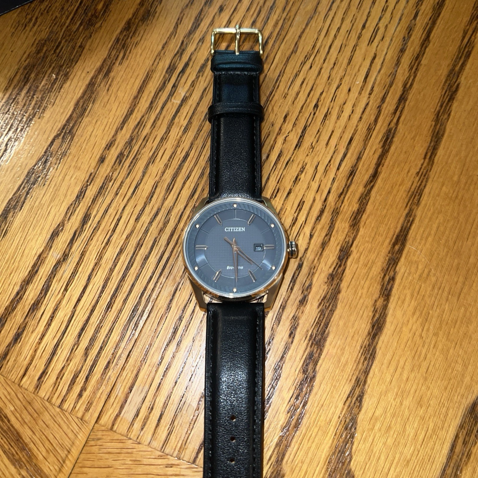 Citizen Eco-Drive Quartz Gray Textured Dial Gold Case Black Leather Date Watch