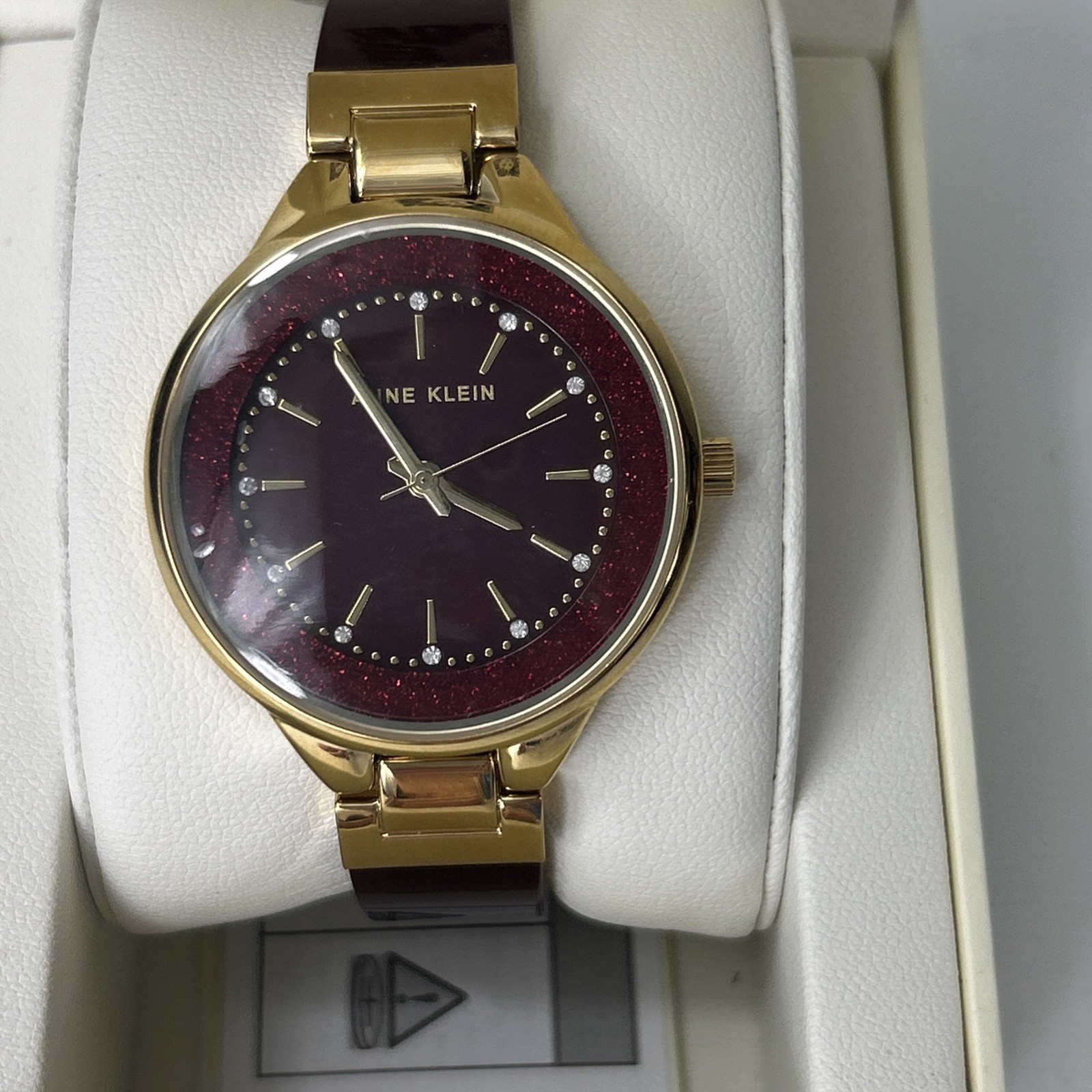 Anne Klein Women’s Quartz Burgundy Resin Gold-Tone Watch – AK/1408BYBY