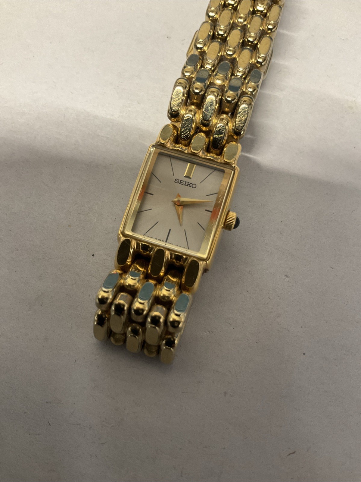 Vintage Seiko 244096 Petite Yellow Gold Tone Classic 13mm Small Tank watch
