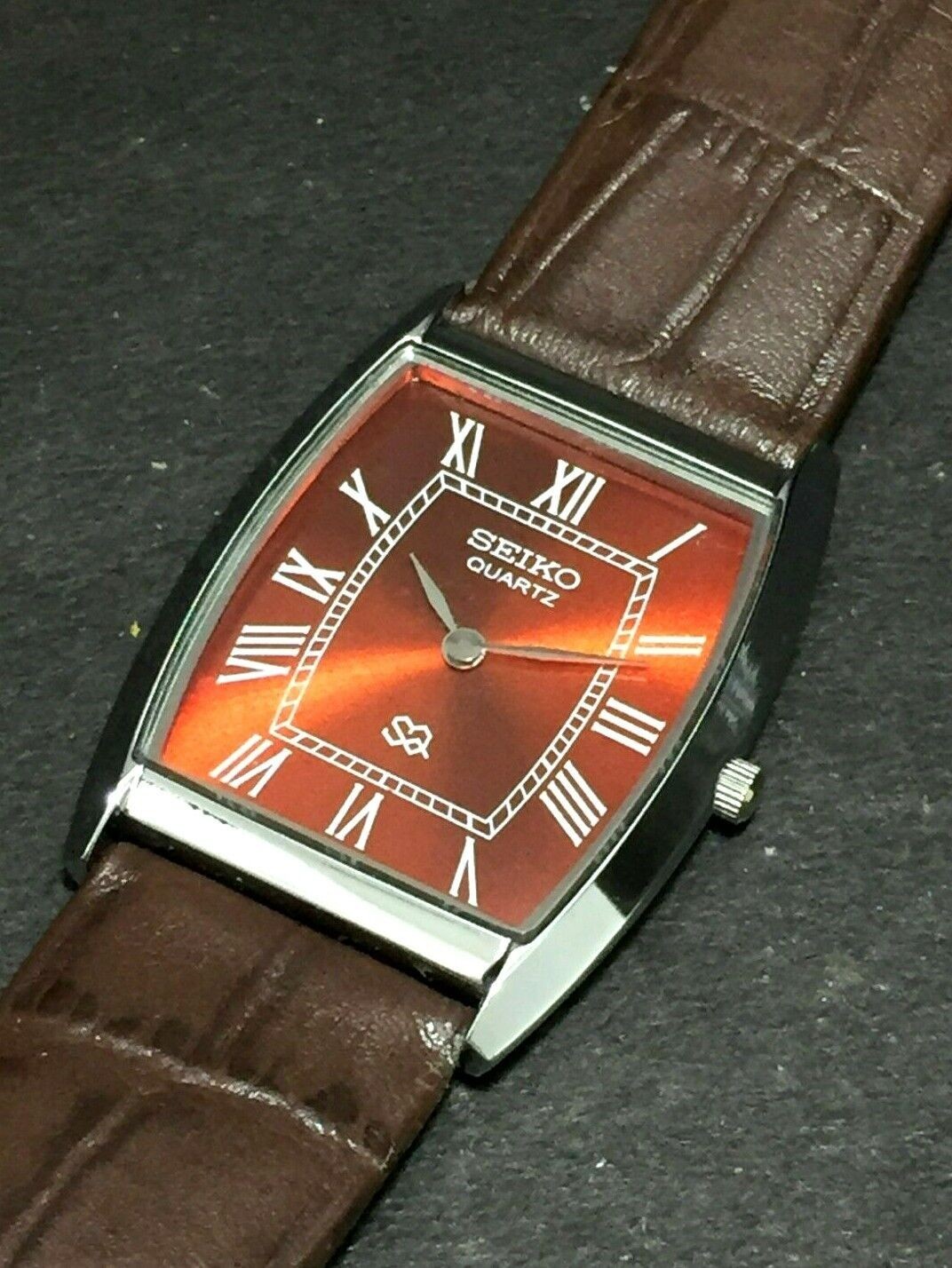 Vintage Seiko Slim Quartz Red Face Japanese Curve Silver 30MM Mens Watch S16