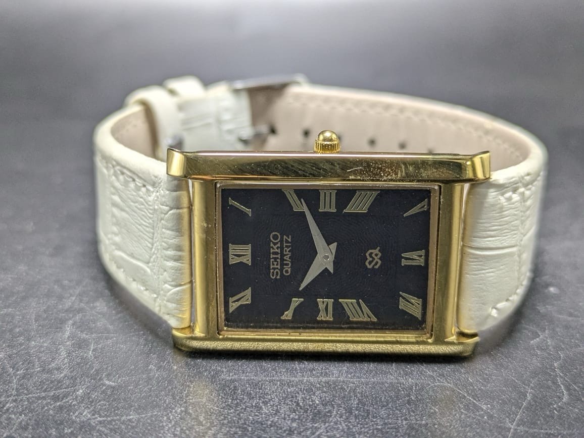 Seiko Quartz Rectangular Black Dial White Band Roman Numerals Men’s Watch