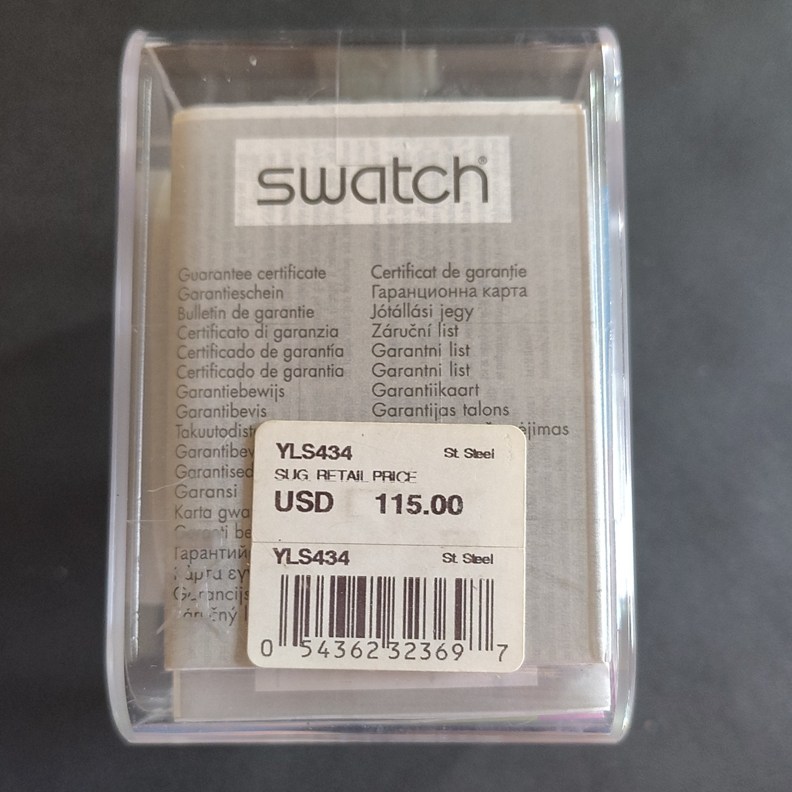 Swatch YLS434 James Bond Villain Quartz Analog Silver Dial White Leather