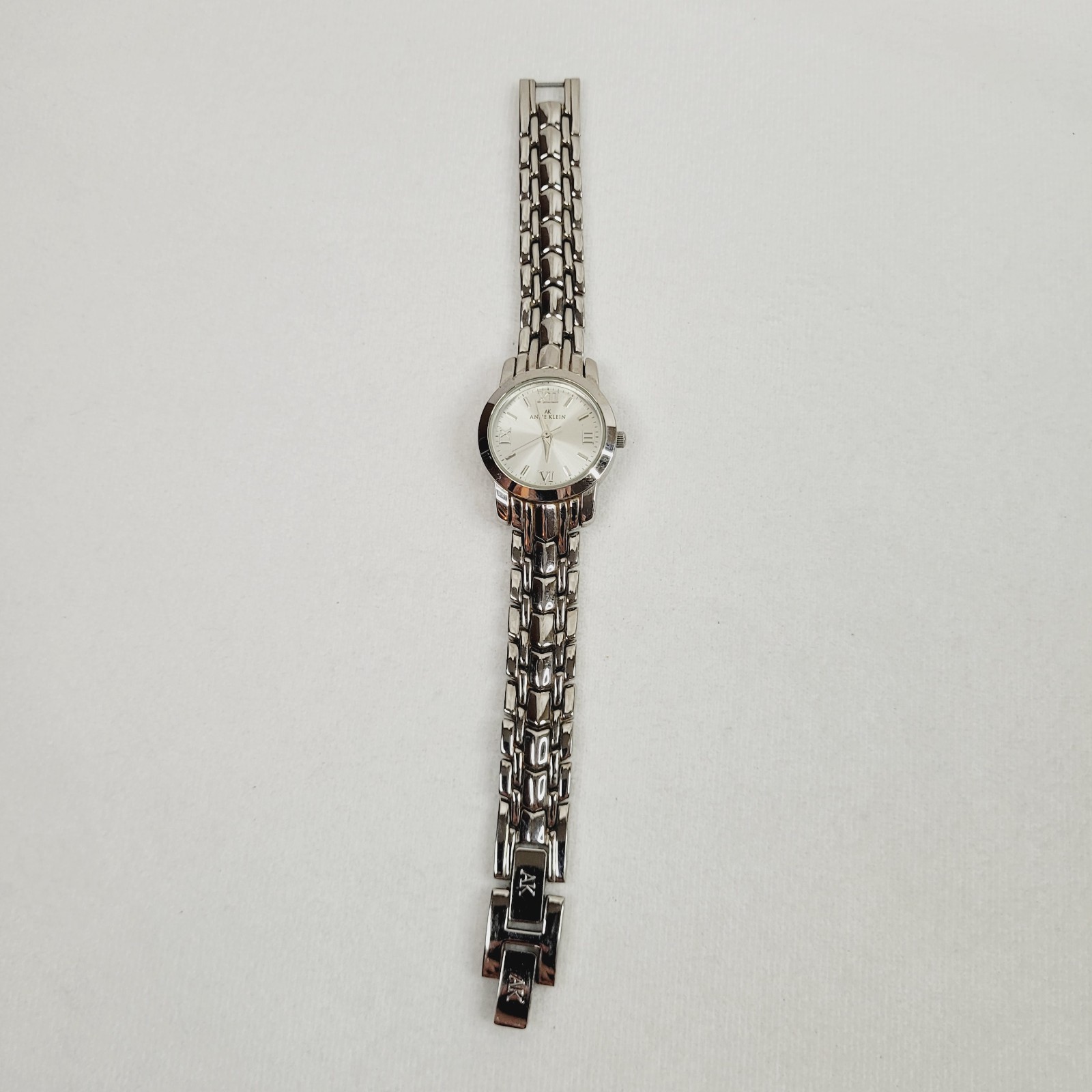 Anne Klein Bracelet Watch Silver Tone White Face Quartz Working Folding Clasp 7″