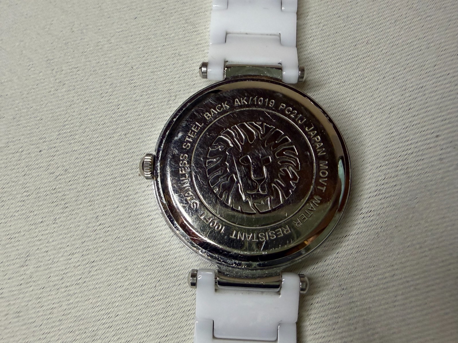 Anne Klein Womens AK/1019WTWT Diamond-Accented Watch with Ceramic Bracelet