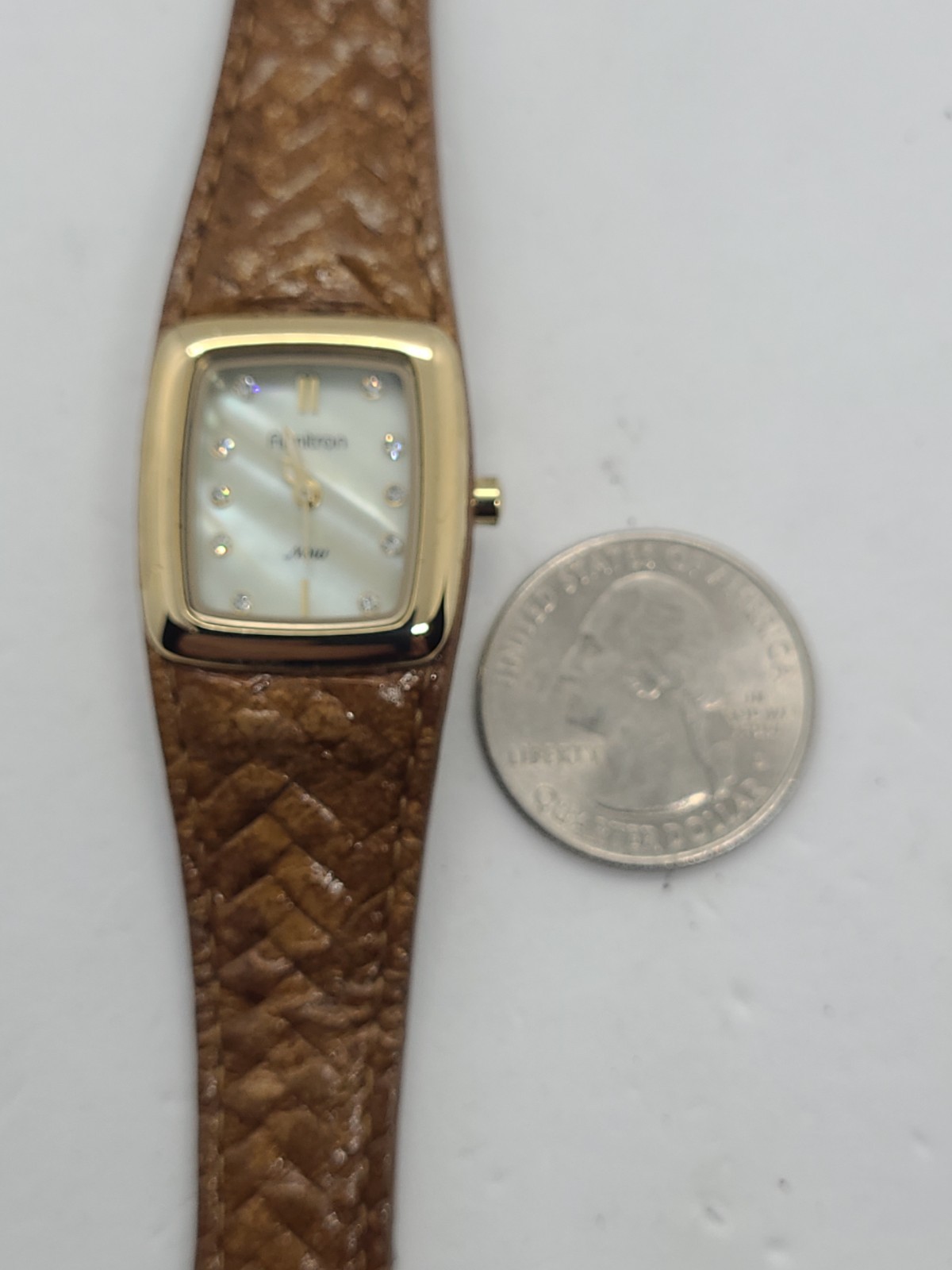 Armitron Now Mother Of Pearl Woven Leather Band Watch New Battery. (93)