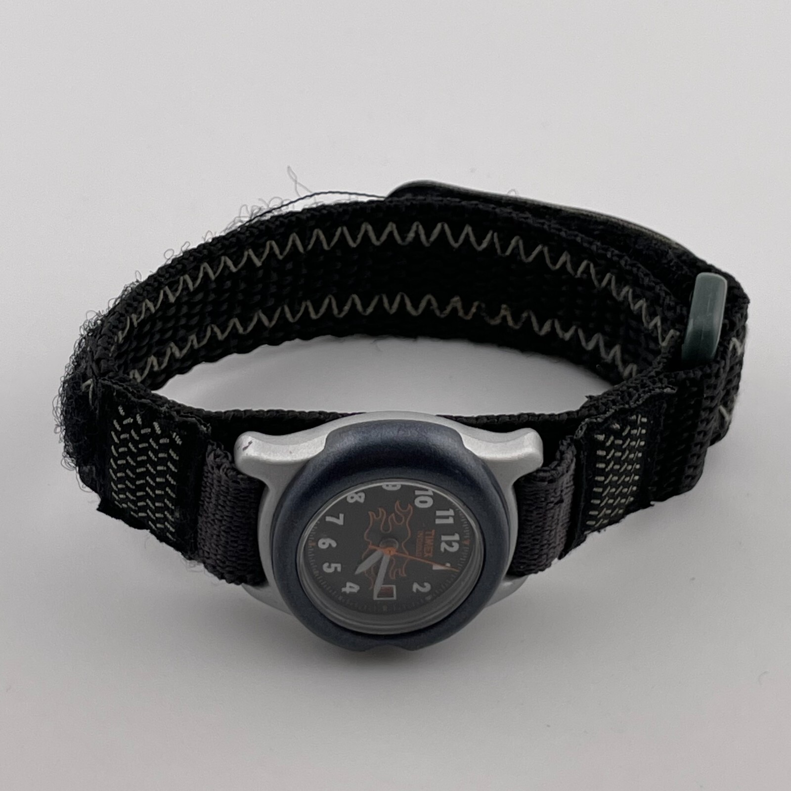 Timex Indiglo Watch Vintage Date Flames 31mm Case One Piece Nylon Strap Quartz