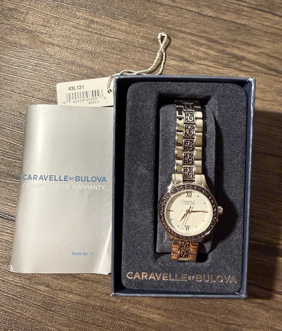Caravelle by Bulova Women’s Quartz Dress Watch silver Bracelet White Roman Dial