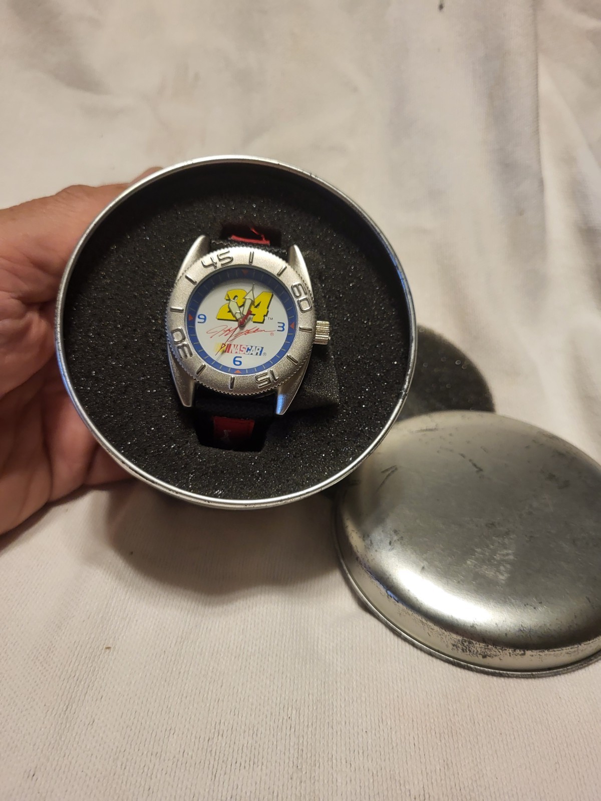 NASCAR 24 Quartz Analog 45mm Stainless Steel Watch, Red/Black Leather, Tin