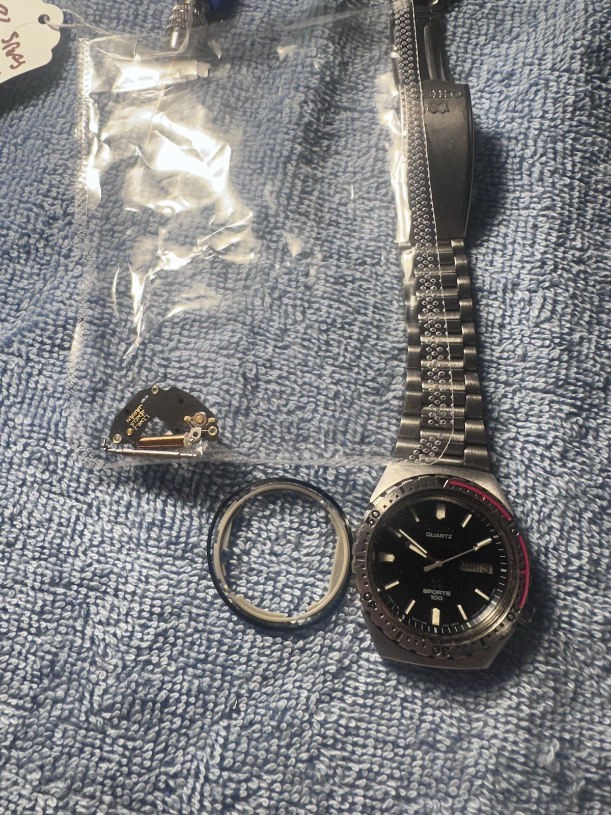 Seiko Sports 100 Men’s Quartz Day/Date Black Dial Rotating Bezel Steel