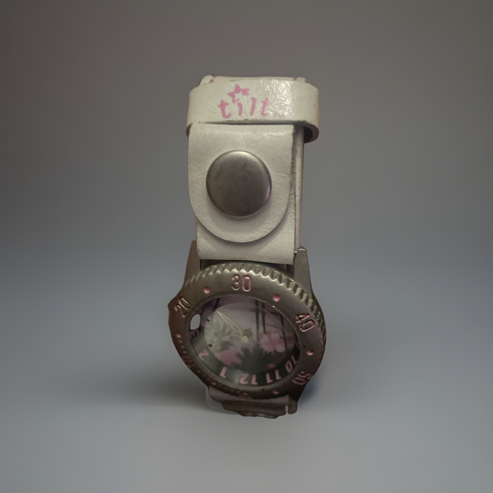 Tilt Watch from Pac sun Women Silver Tone Pink Palm Dial Brown band Quartz 27mm