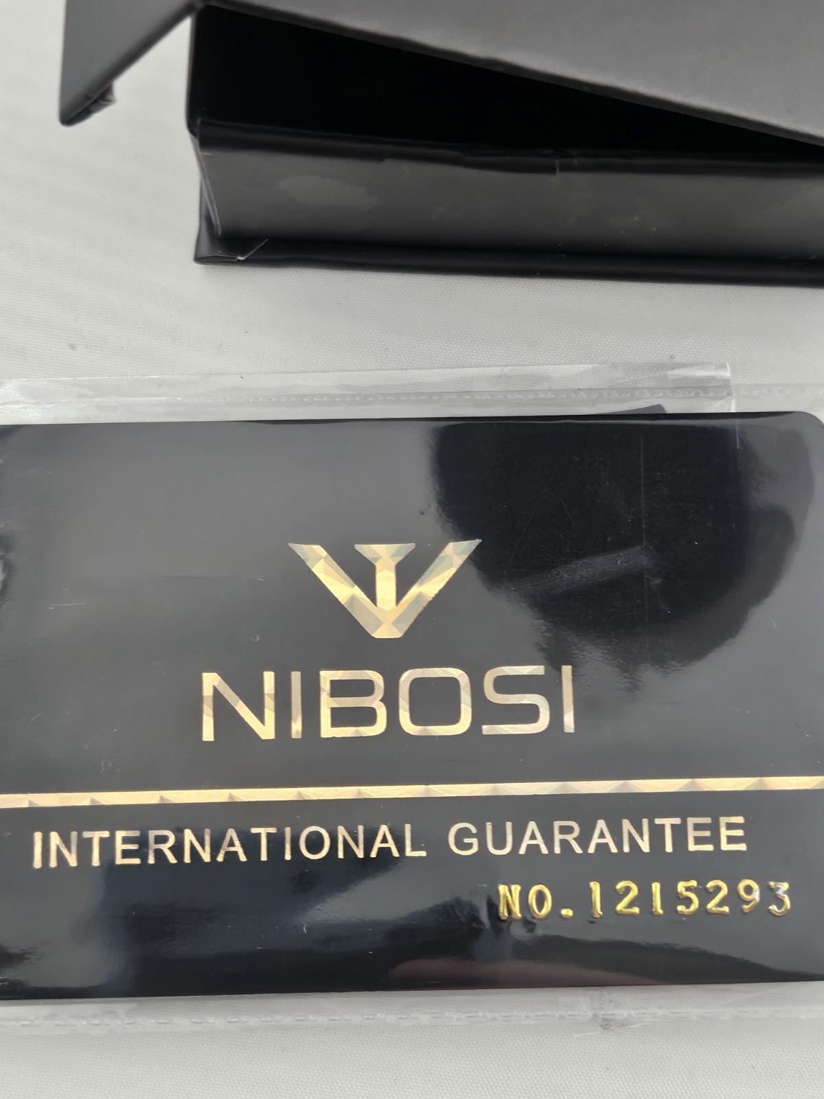 New In Box Nibosi 1985 Blue Striped Dial Day Date Quartz Movement Running